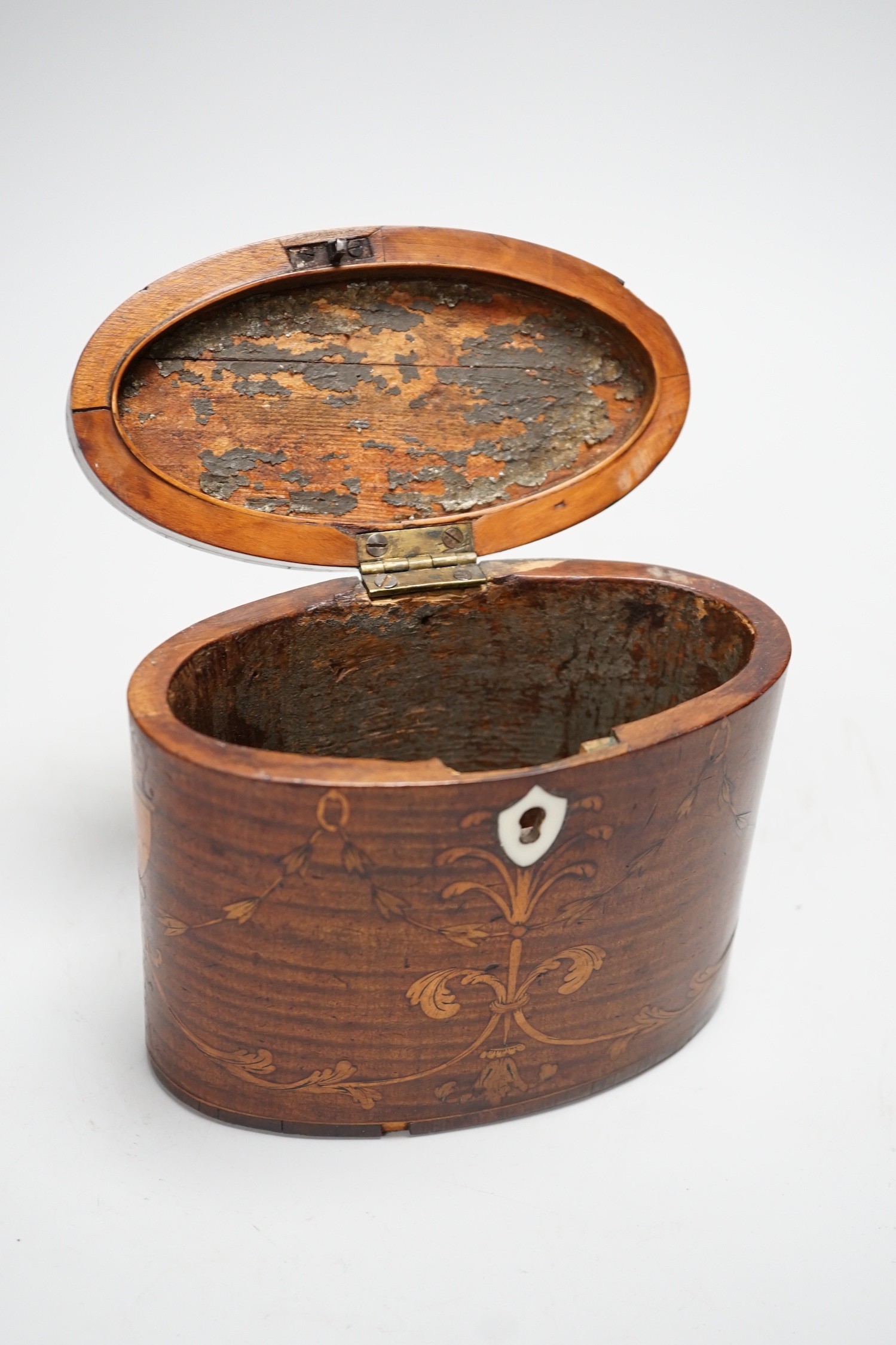 A George III oval harewood and marquetry tea caddy, c.1790, 12cms high x 15cms wide